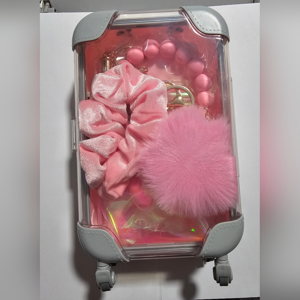 Mini makeup suitcase with accessories inside
